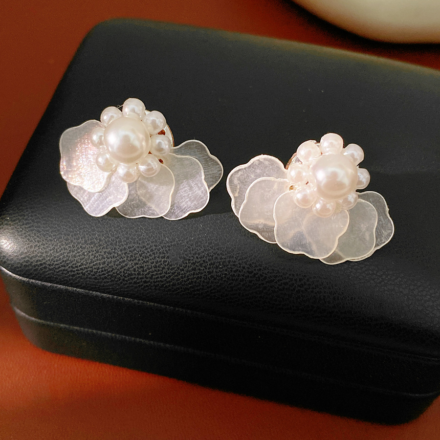 Layered Star-shaped Shell Stud - đánh giá và giá Cluster Stud Ear